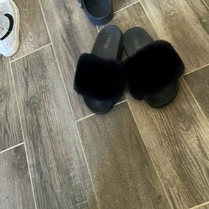 black furry slippers